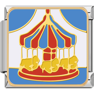 A colorful carousel with red, blue, and yellow accents inside a shiny silver Italian charm link.